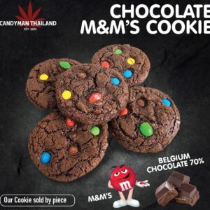 Freshly baked chocolate cookies with colorful M&M's candies on top, perfect for sweet cravings.